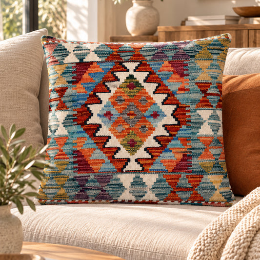 Colorful kilim-style square cushion cover with geometric diamond pattern, fringeless edges