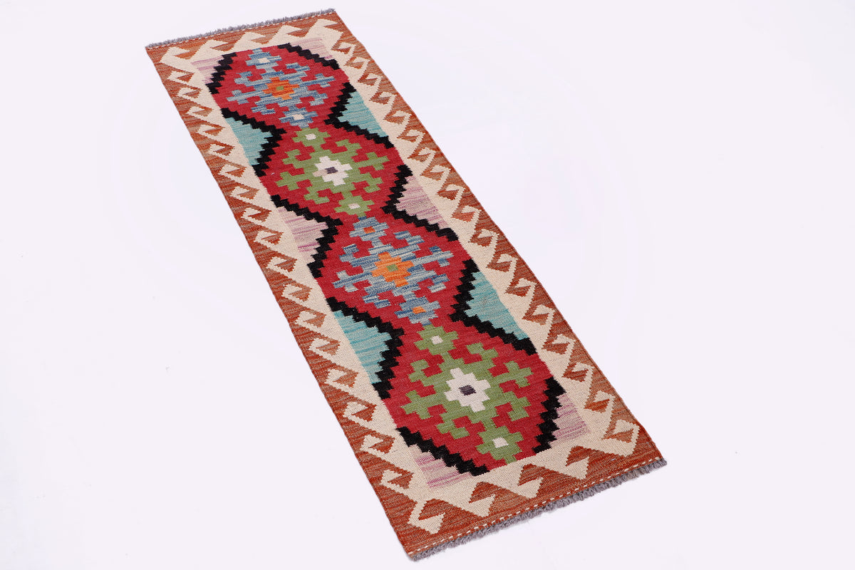 Multicolor kilim rug, geometric motifs in red, green, blue, and cream, 145x48 cm