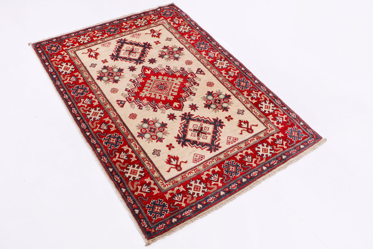 Kazak red rug 148x102 cm, cream center with red geometric pattern and dark border