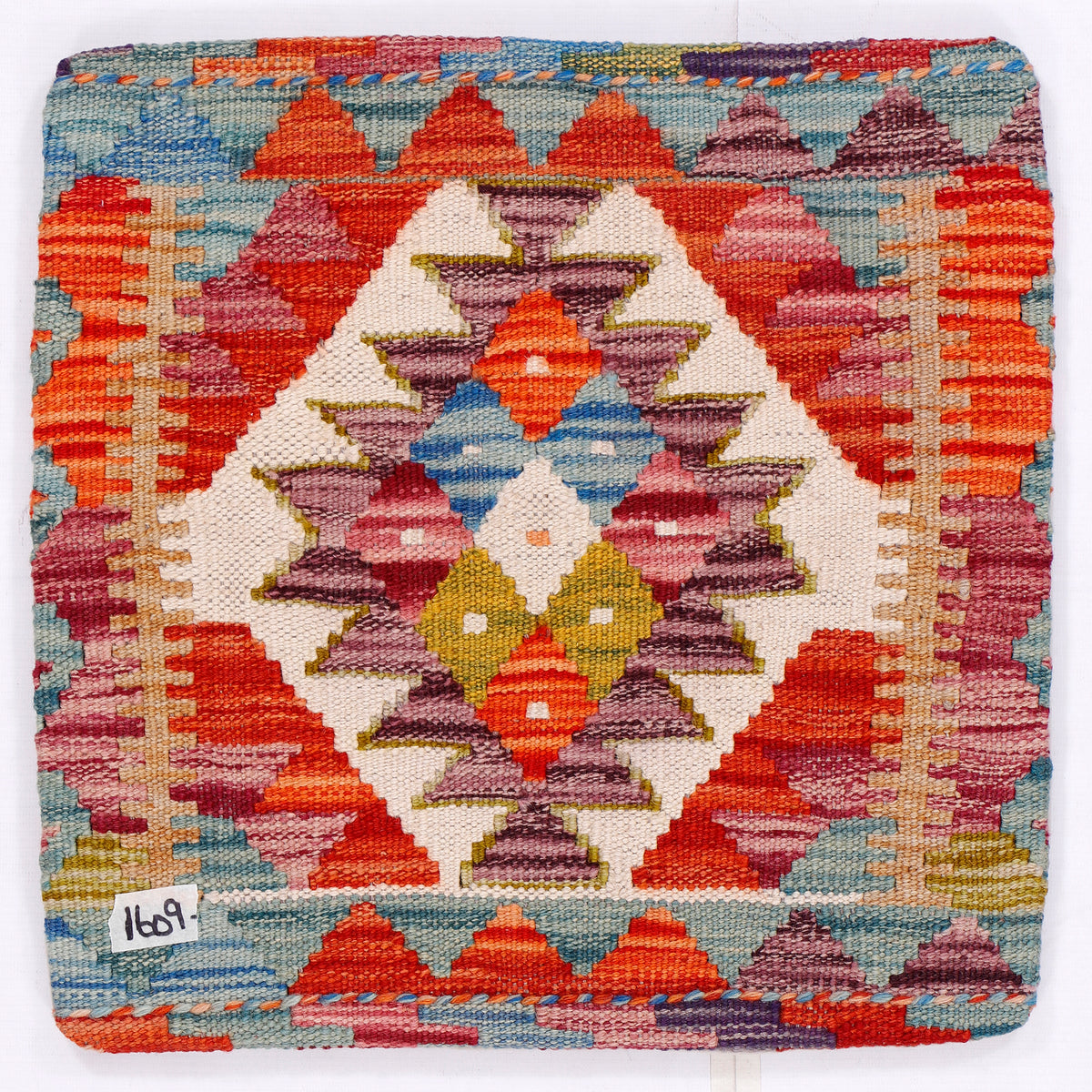 Square multicolor diamond kilim cushion cover with woven pattern, front view