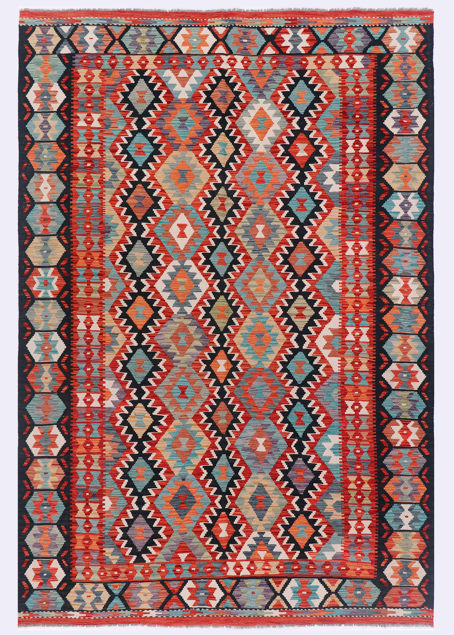 Kilim rug with centered diamond-and-arrow pattern in red, teal, orange, cream, and black