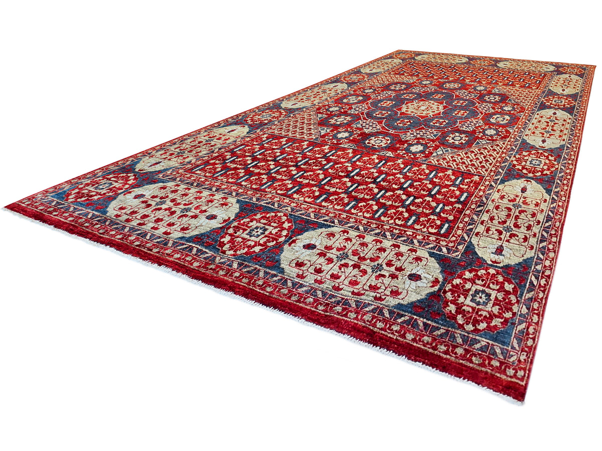 Mamluk rug with red geometric layout, navy detailing, and cream corner ornamental blocks