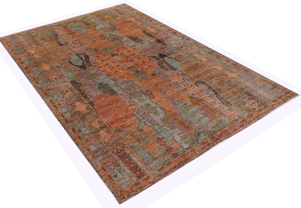 Multicolor designer rug laid flat; distressed medallion pattern in rust, teal, olive, beige.