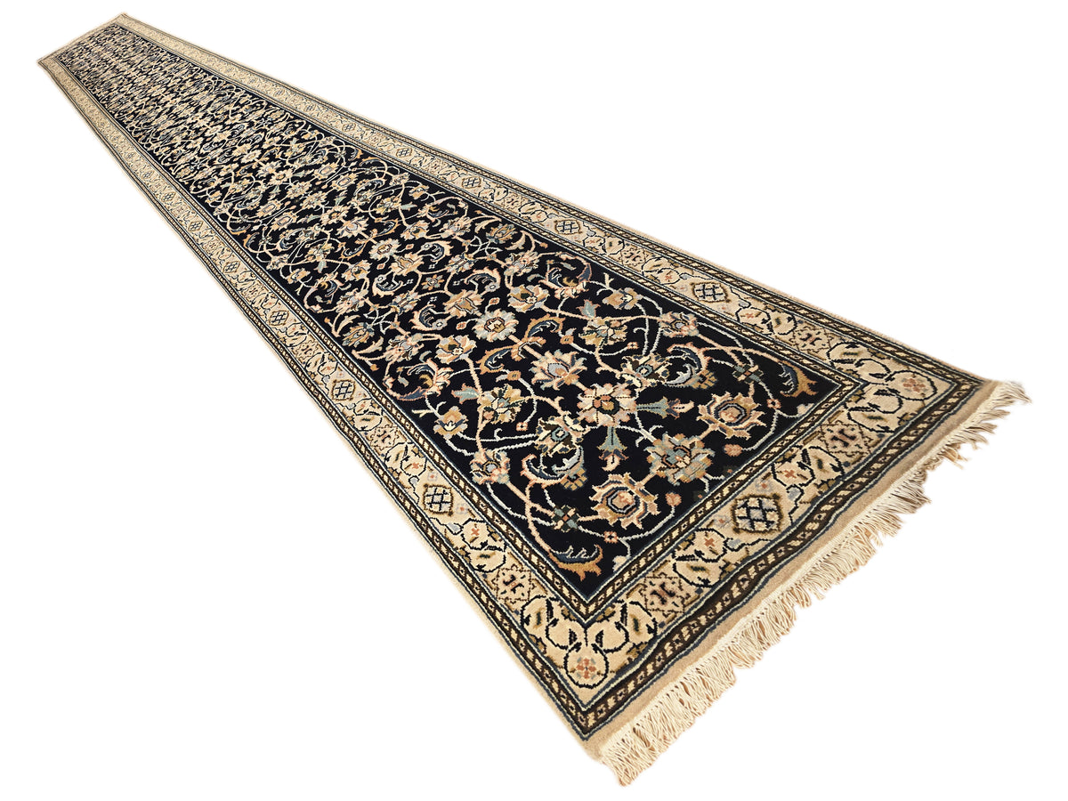 Nain runner rug 599x81 cm with dark navy center, gold scrollwork, cream border, fringed ends