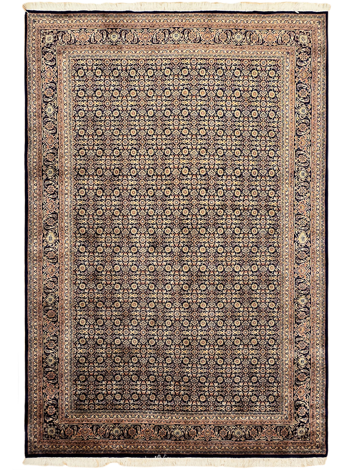 Bidjar-style rug with repeating medallion pattern, dark blue, tan, and rust accents
