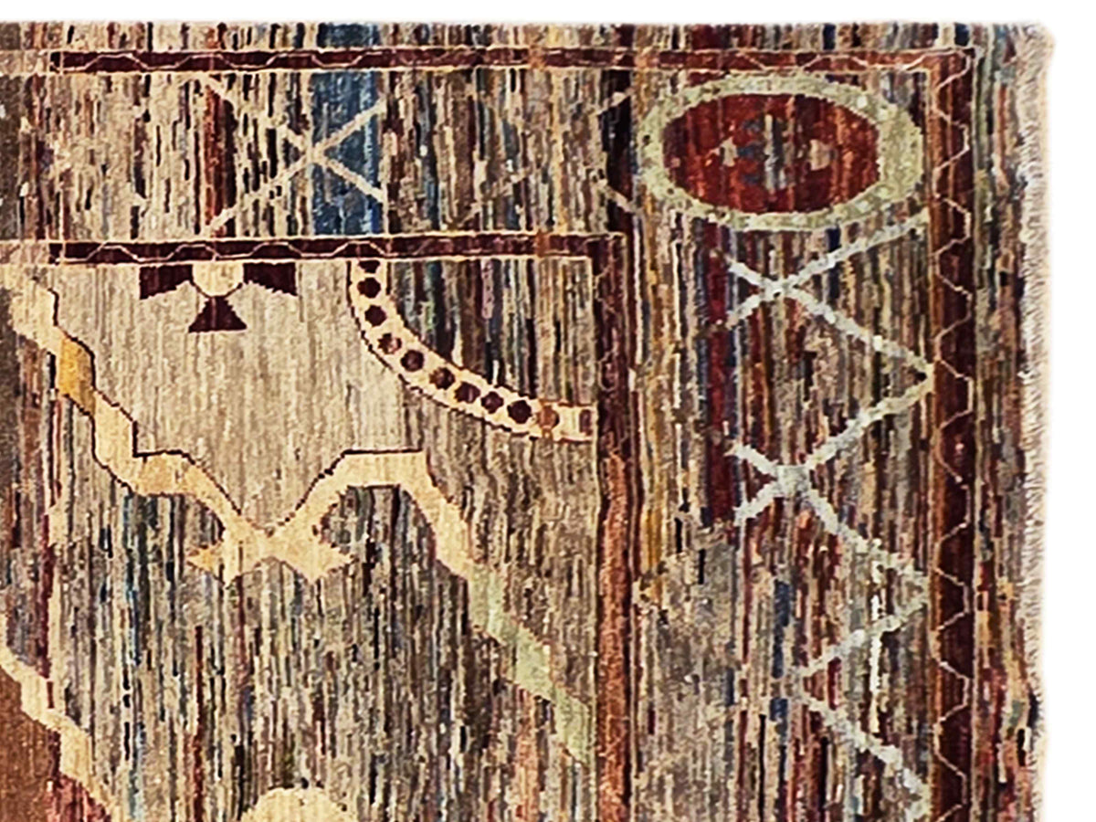 Ziegler Art Deco rug close-up, vertical striping and arch motif in reds and blues