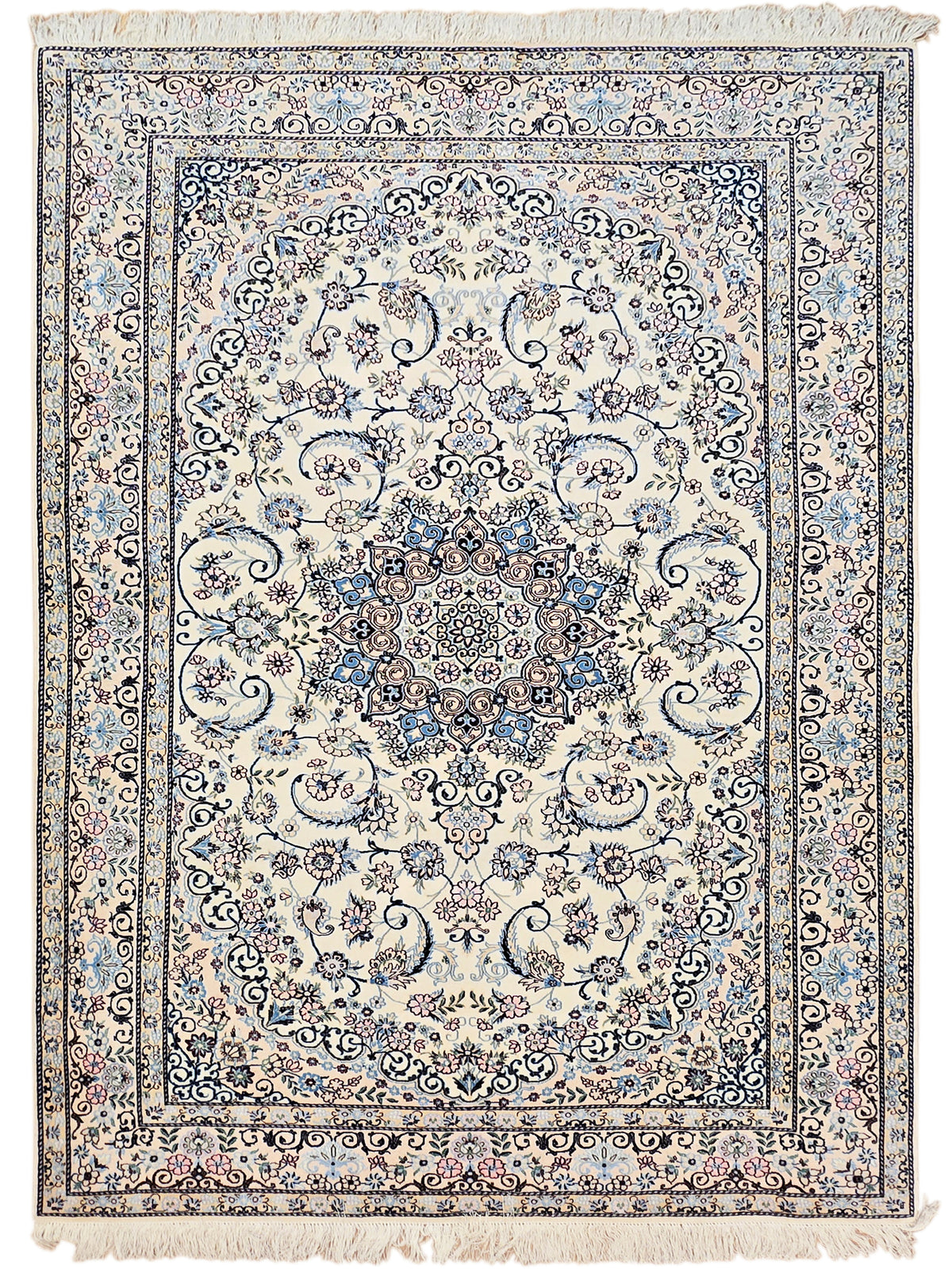Cream area rug with blue floral medallion and ornate border, square corner fringe
