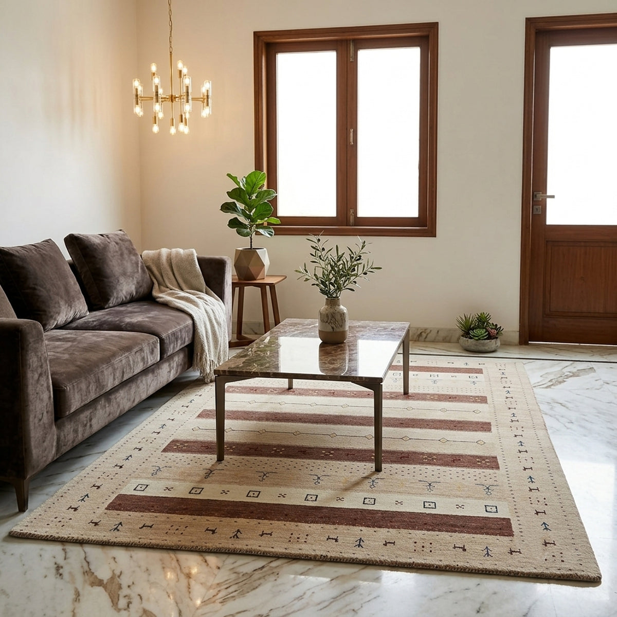 Handloom rug on floor with beige base, dark brown stripes, and small repeating symbols.