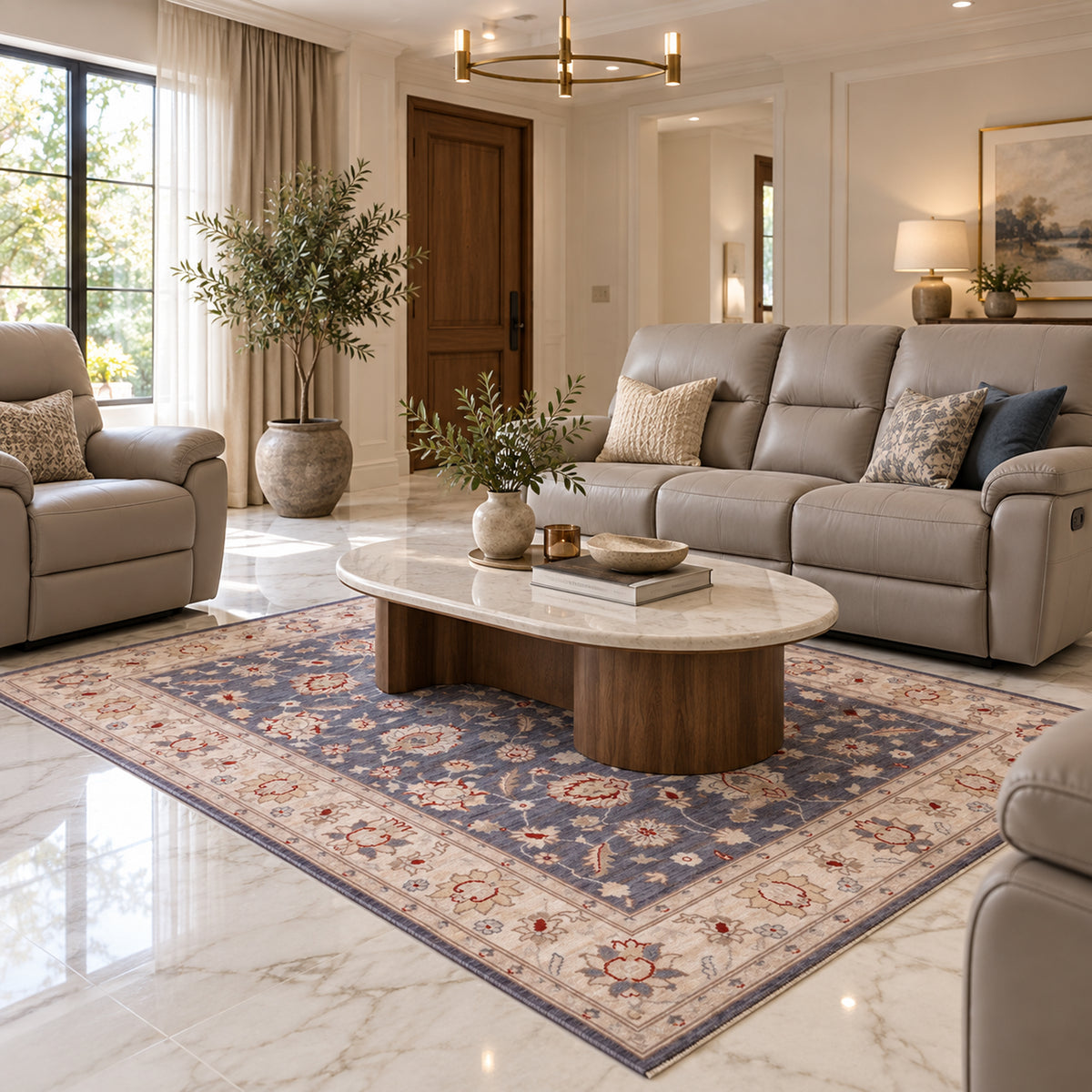 Blue Farahan-style area rug with red floral motifs and patterned border