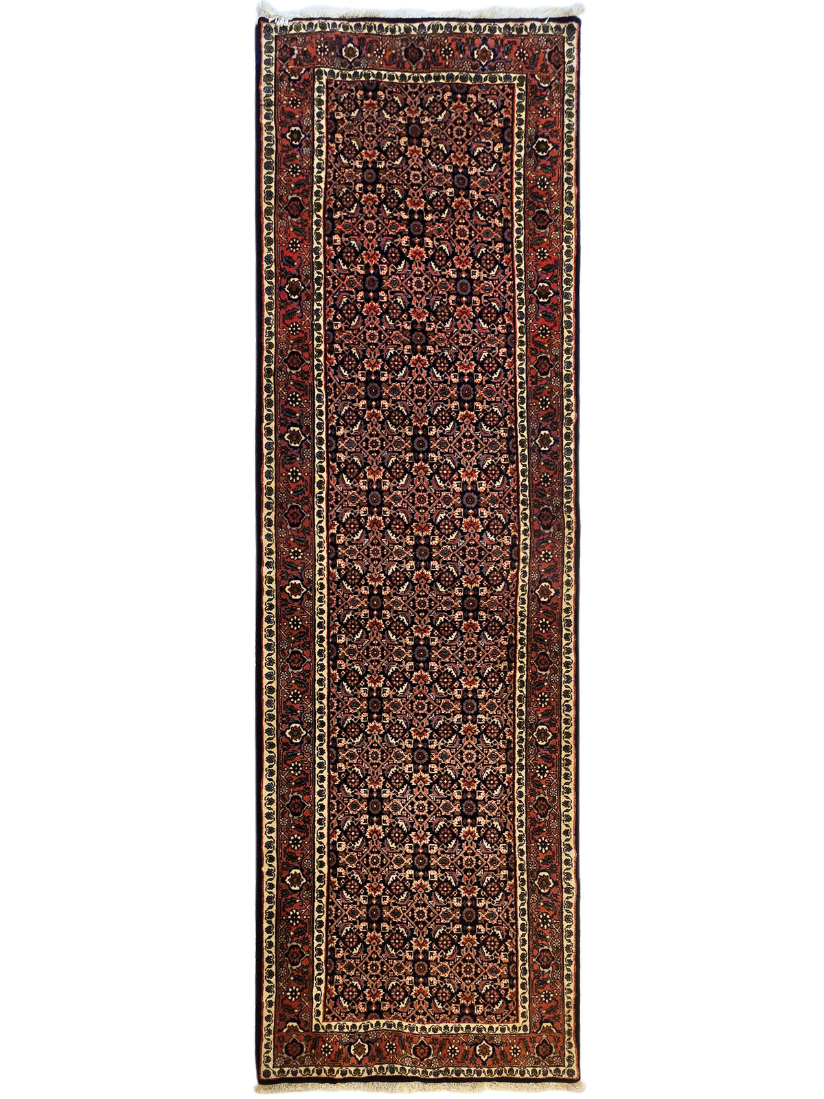 Bidjar rug with dark red central pattern, narrow side borders, and thin dark fringe.