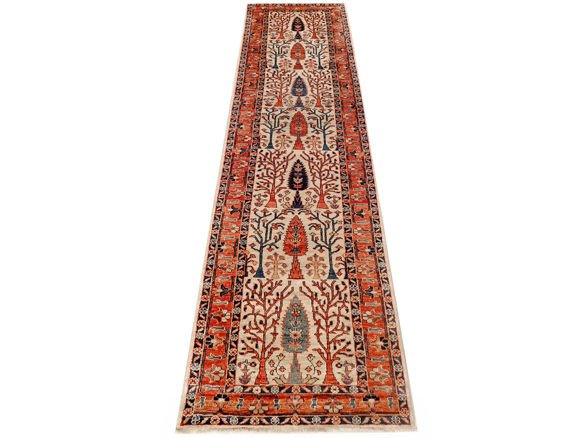 Red and beige patterned runner rug with ornate medallion and border details