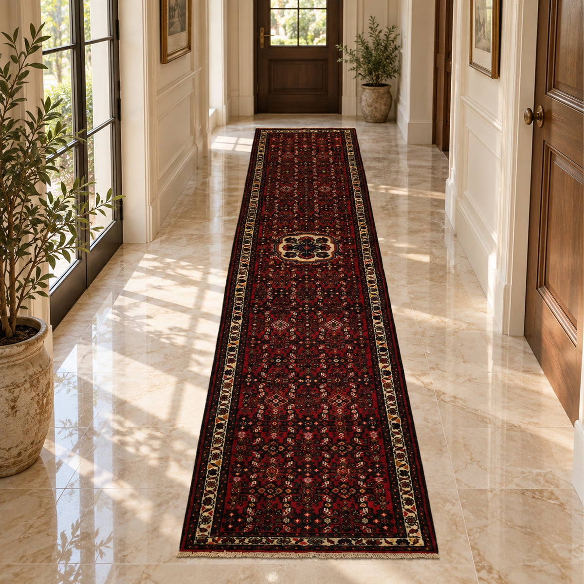 Runner rug with red floral field, central medallion, and cream border trim