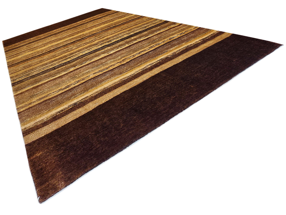 Rectangular area rug with wide tan stripe bands and dark brown sections.