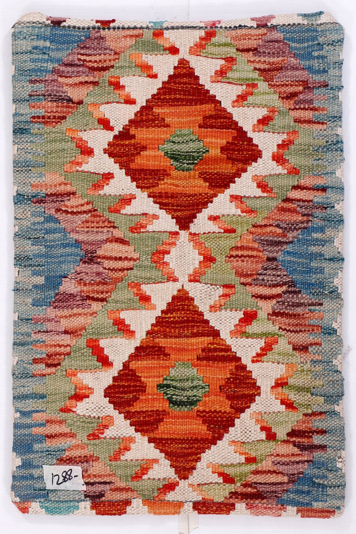Kilim cushion cover with multicolor diamond pattern, orange medallions on blue