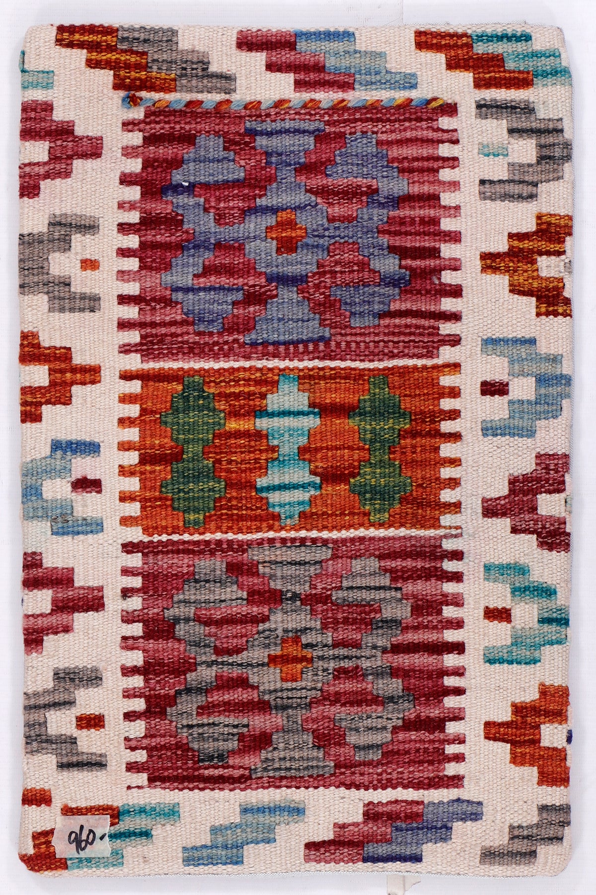 Kilim cushion cover front with multicolor geometric pattern and woven border