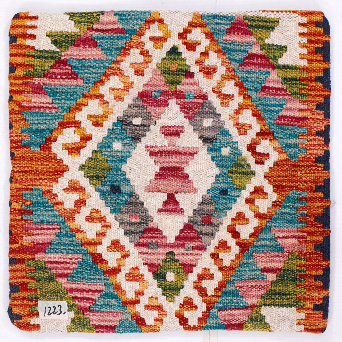 Multicolor kilim cushion cover front with close-up diamond and cross-stitch pattern