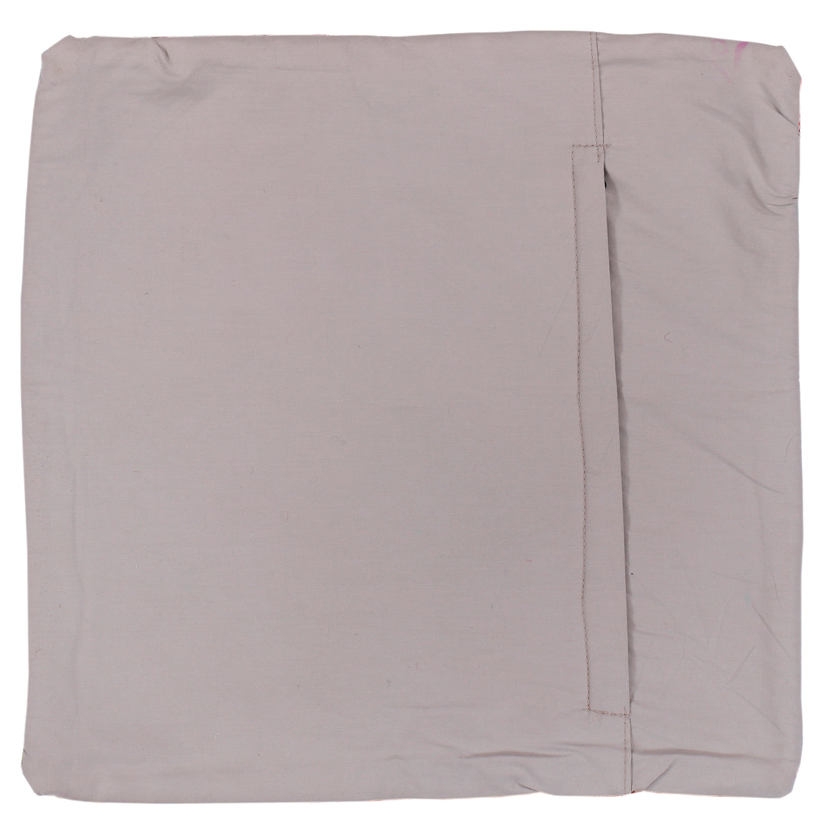 Light-colored square cushion cover backside with smooth fabric and hidden seam lines