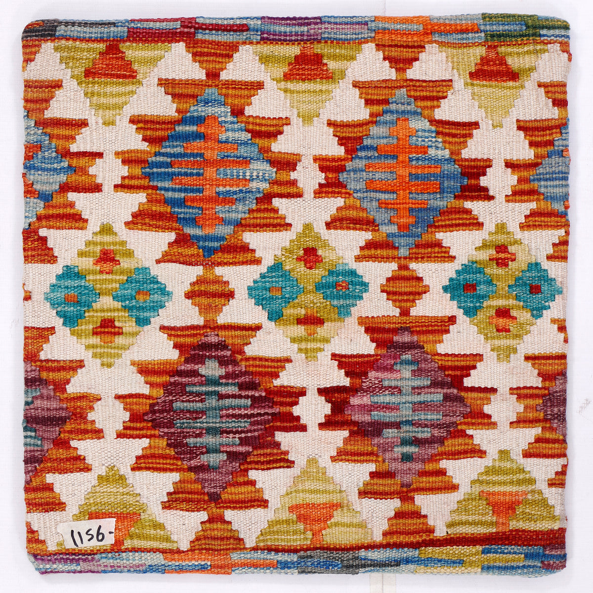 Kilim cushion cover front, multicolor diamond pattern in orange, blue, teal, and yellow
