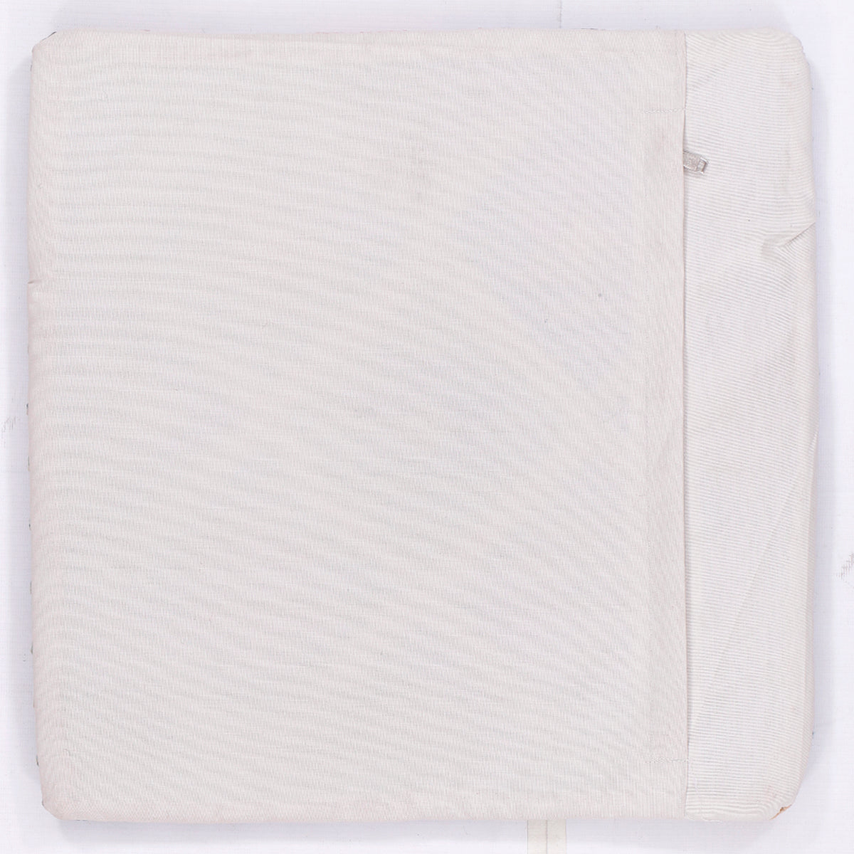 White textured kilim cushion back with stitched edge and overlap
