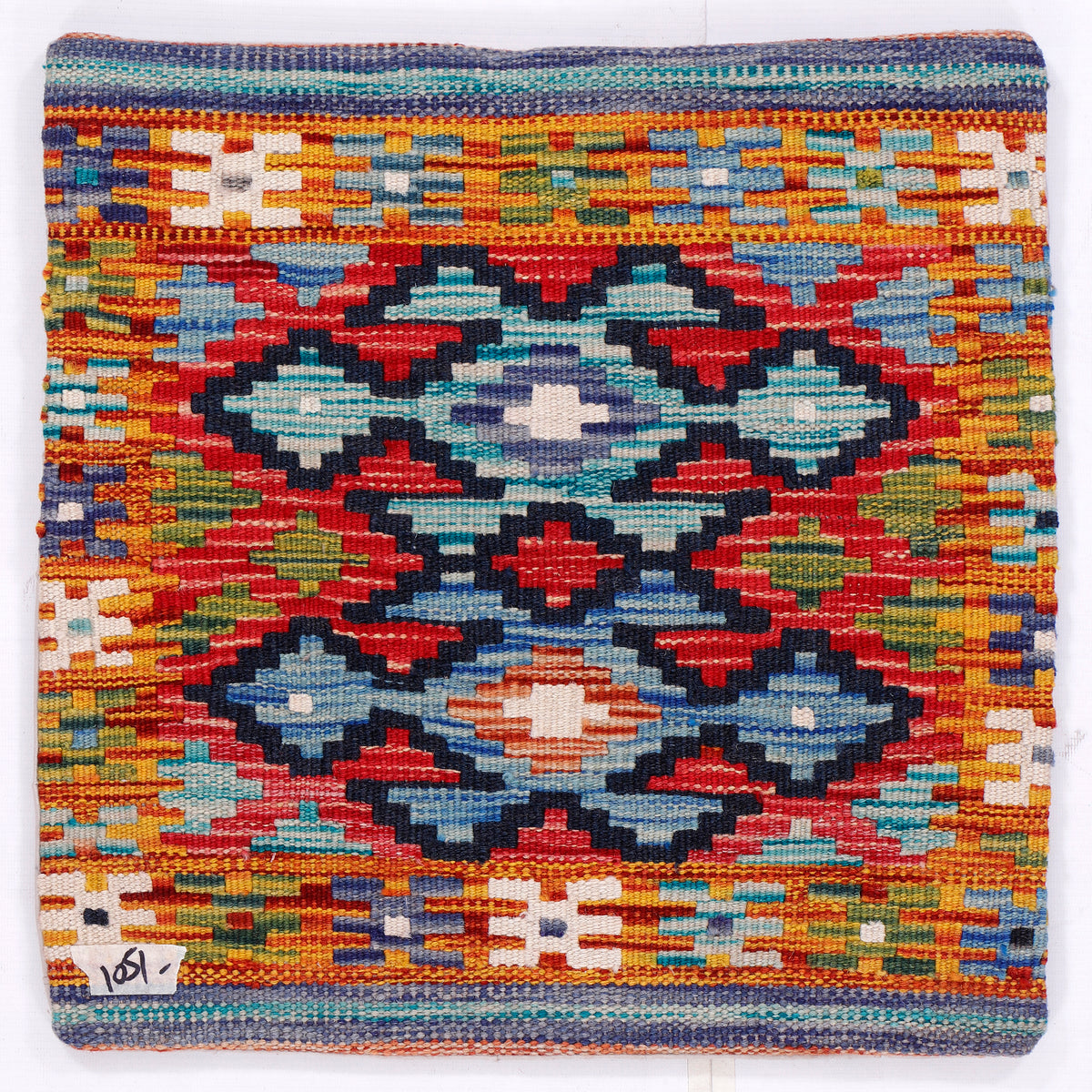 Tribal kilim cushion cover, square geometric pattern with red, teal, blue and yellow