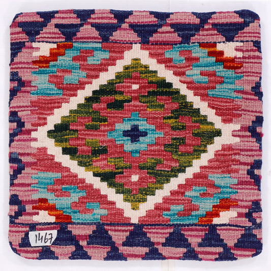 Kilim cushion cover close-up of multicolor diamond medallion pattern, front