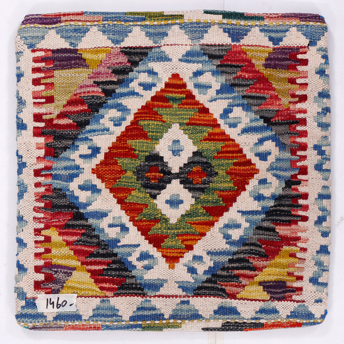 Multicolor kilim cushion cover close-up with central diamond motif