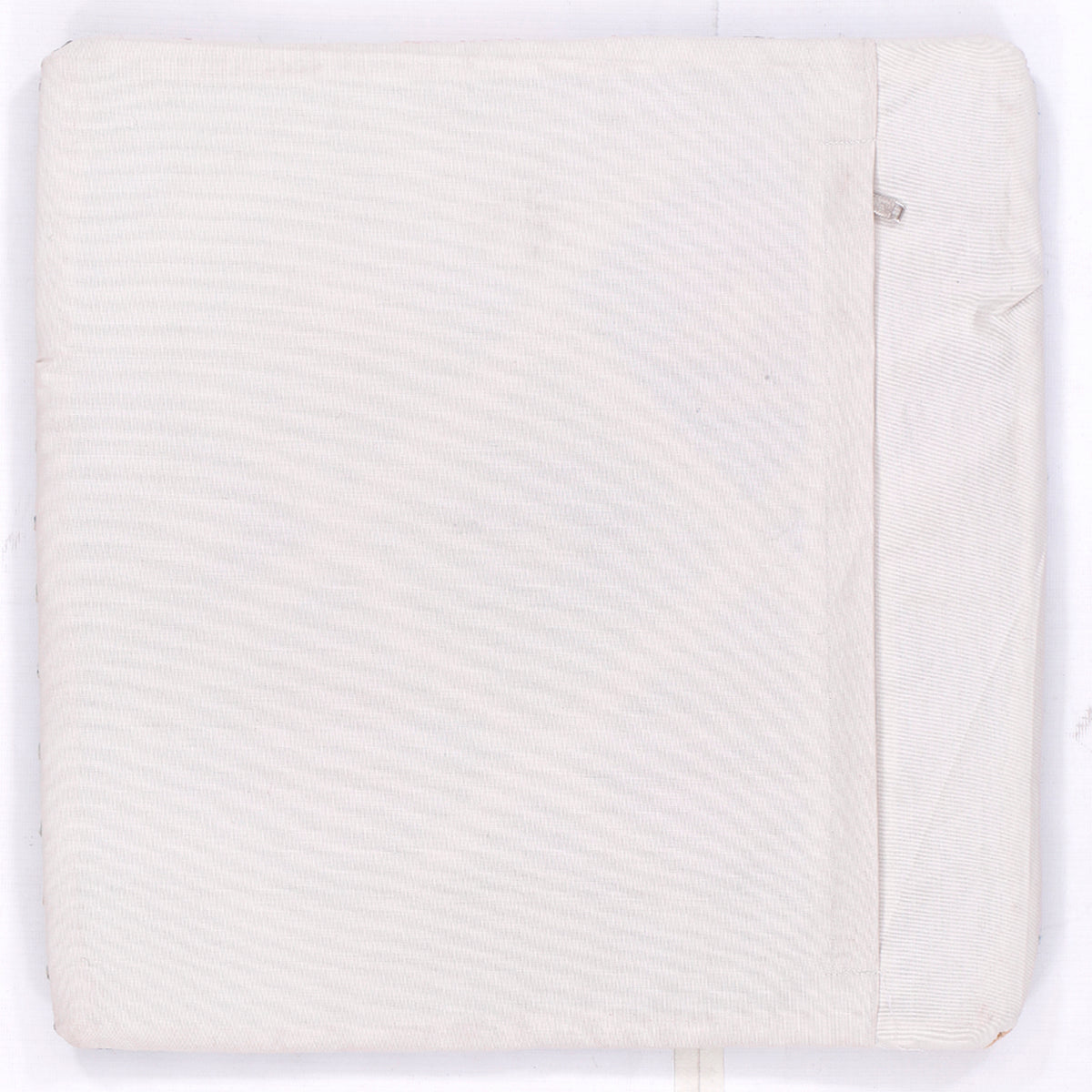 Kilim cushion cover back, plain light cream with textured weave and side seam