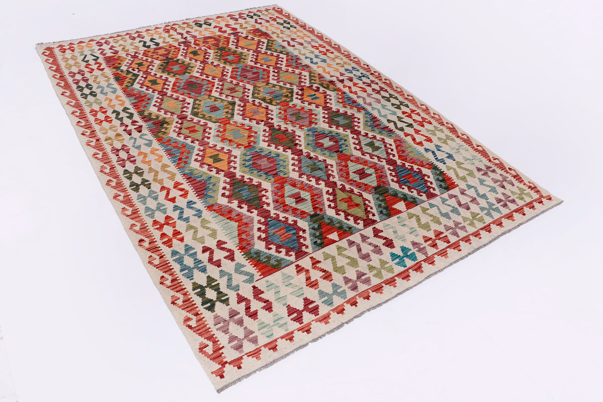 Kilim rug angled view with red border and multicolor geometric medallion