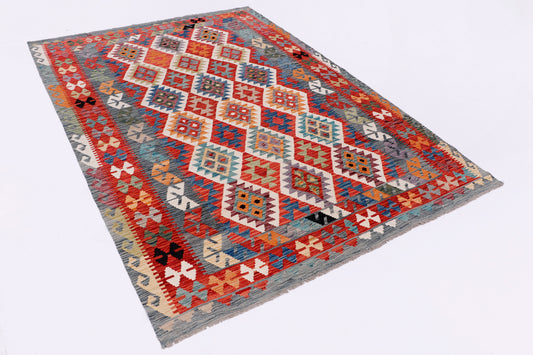 Geometric kilim rug with red border and blue, cream, and orange center pattern