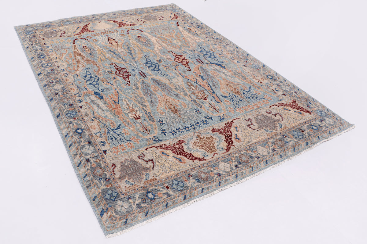 Khyber Oushak rug, light blue field with ornate red-and-navy medallions, flat