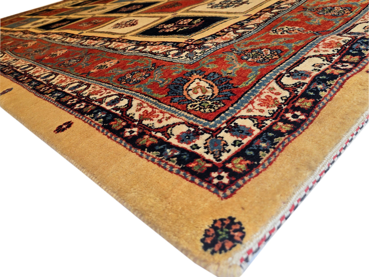 Corner view of multicolor rug with central medallion motifs and beige ground