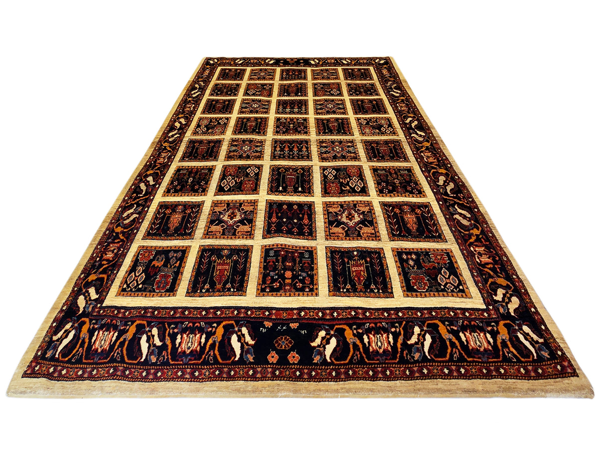 Loribaft rug, dark navy and rust with beige geometric grid and border