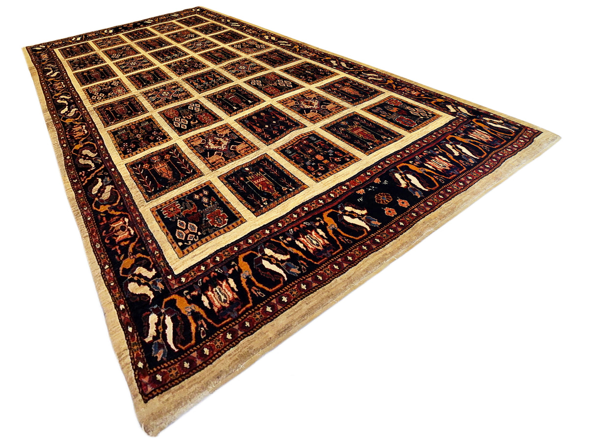 Loribaft rug, navy and rust diamond lattice with cream-beige corner field
