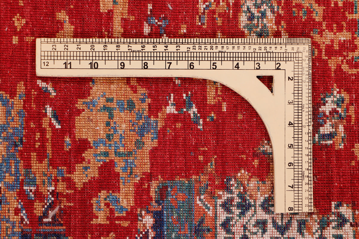 Kilim rug measured with ruler; red and blue distressed medallion pattern