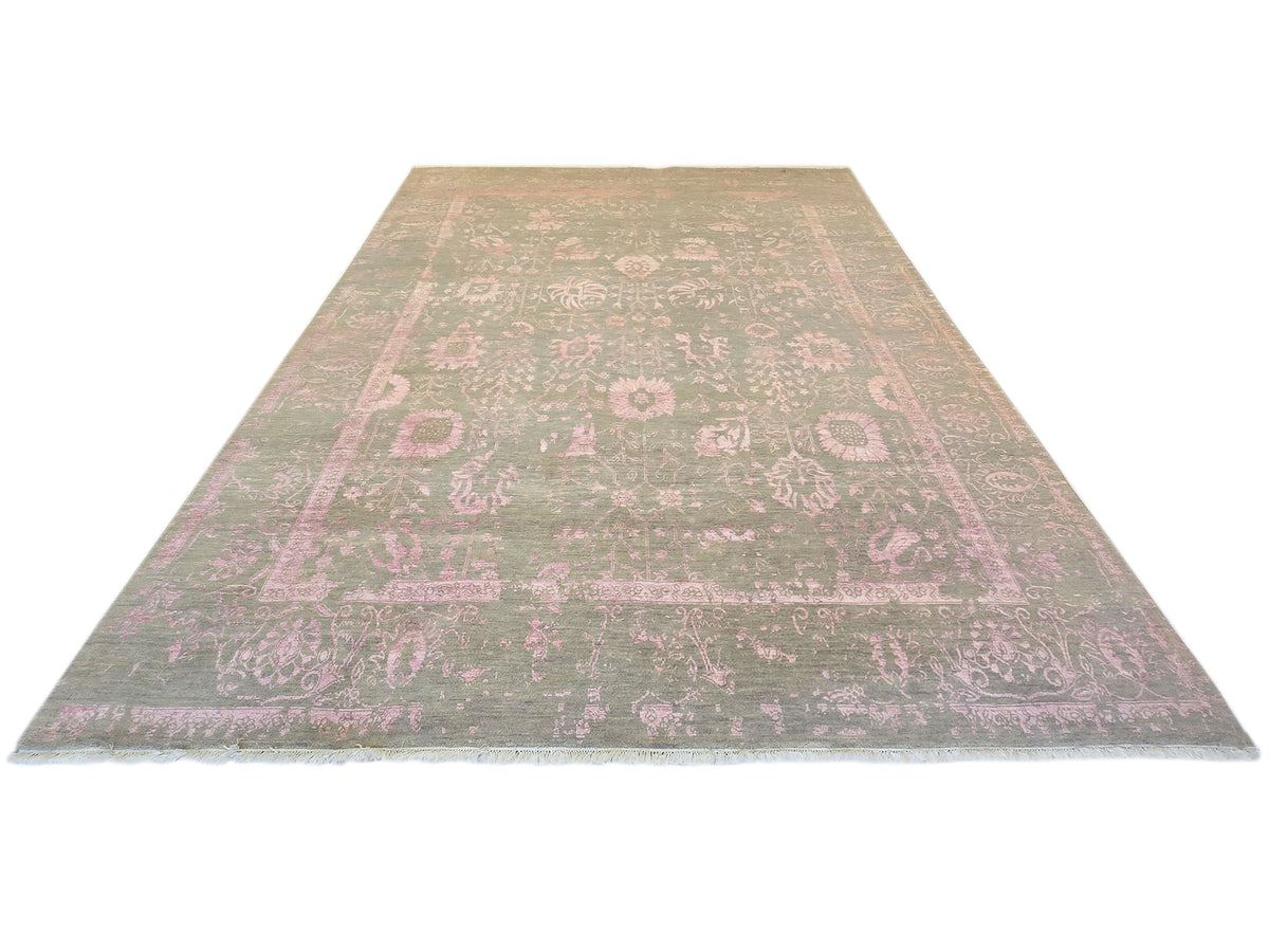 Rectangular modern area rug, gray base with faded pink ornate pattern