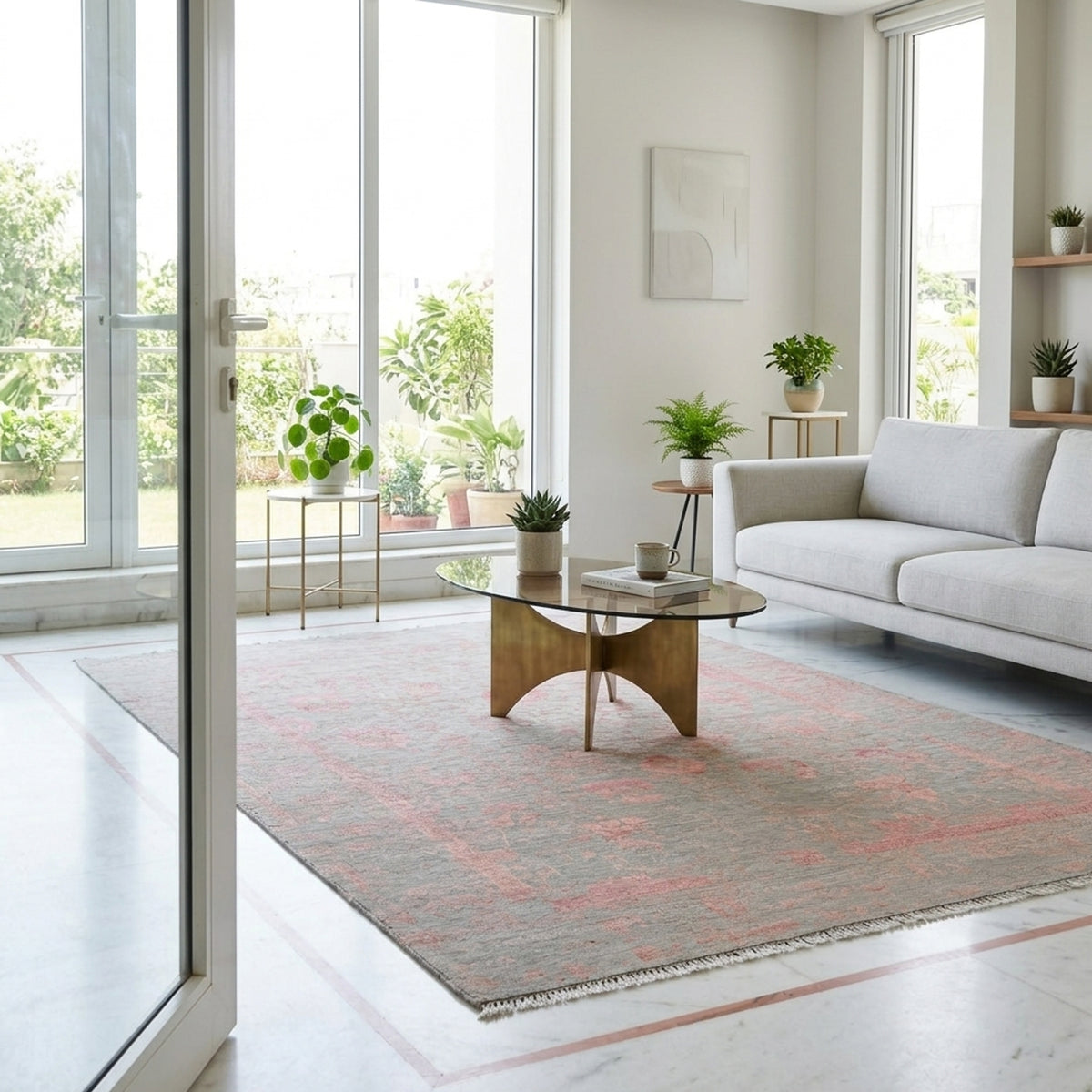 Large rectangular modern area rug, gray ground with faded pink pattern