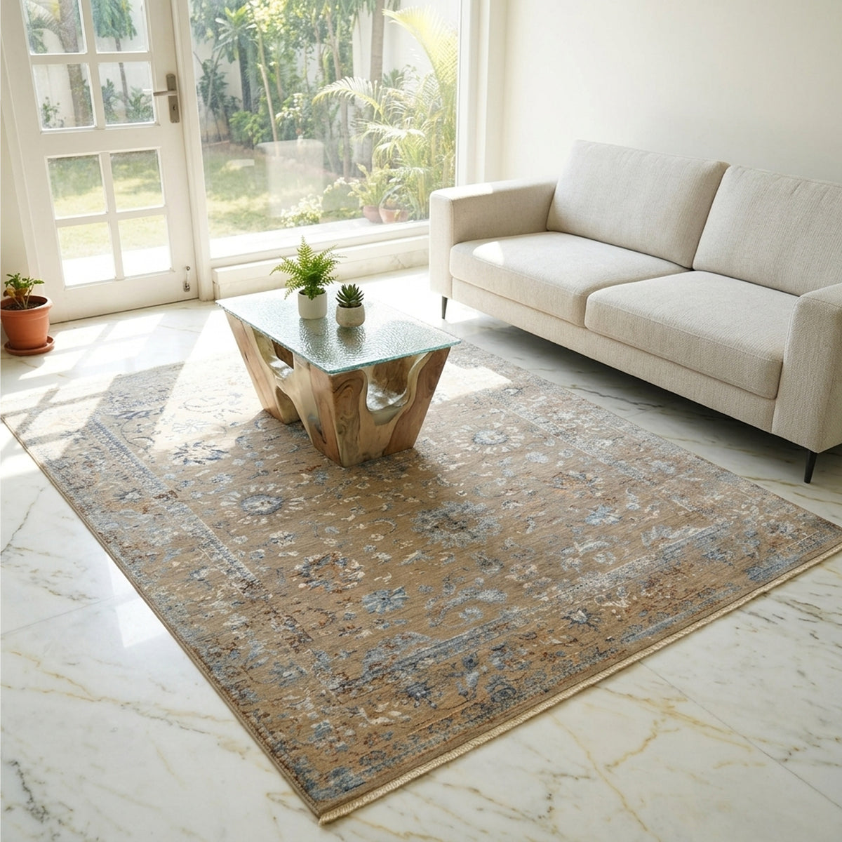 Modern area rug with distressed floral pattern, beige and blue, short fringed edges