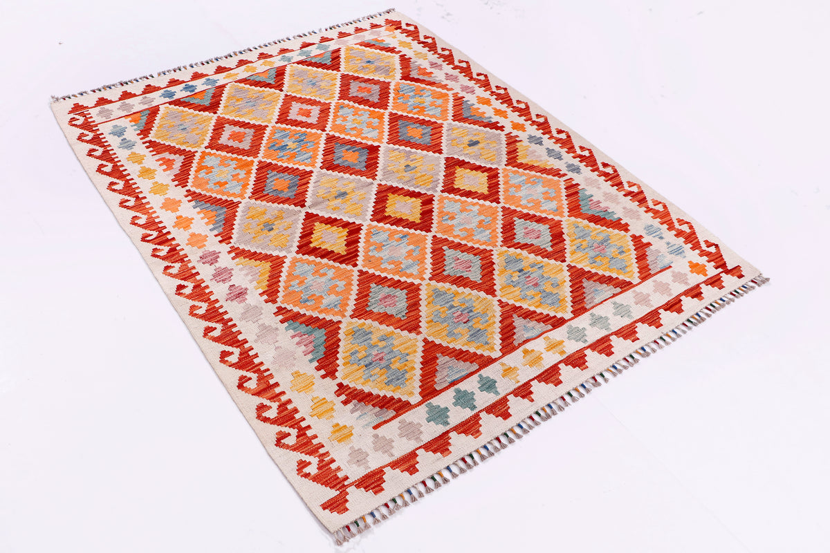 Multicolor kilim rug with geometric pattern and trimmed edge, corner view.