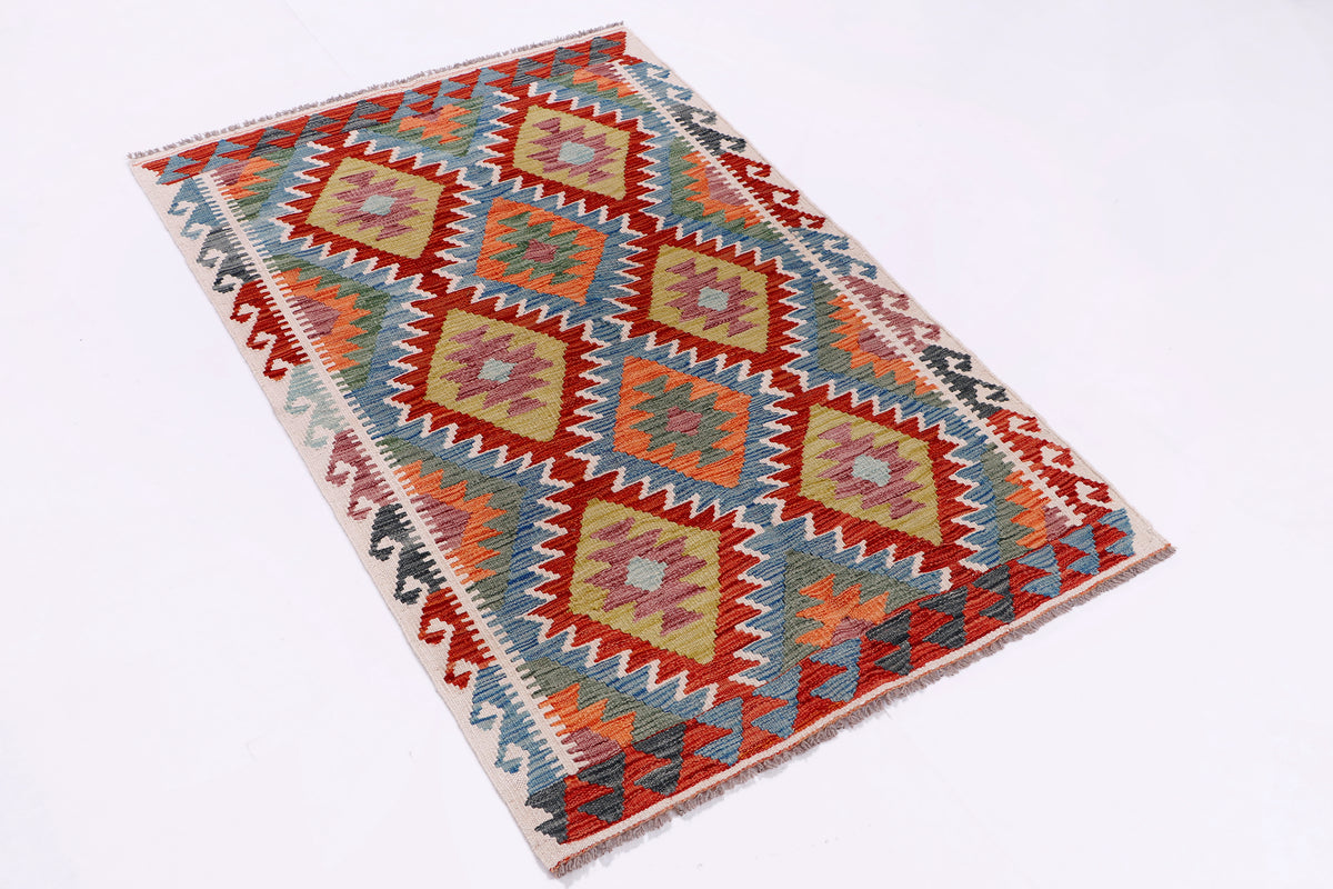 Rectangular kilim rug, diagonal view, multicolor geometric pattern in red and blue