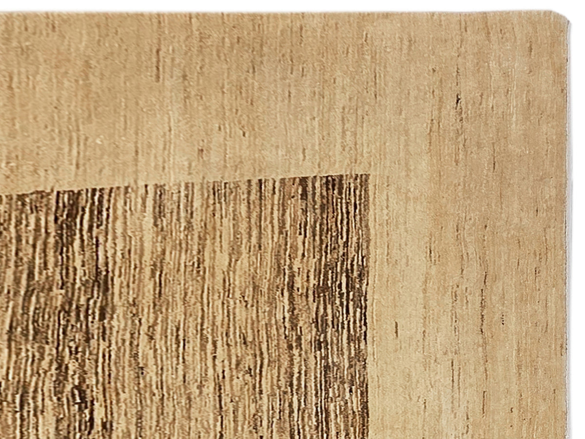 Beige rug close-up with dark brown horizontal stripe motif and textured pile