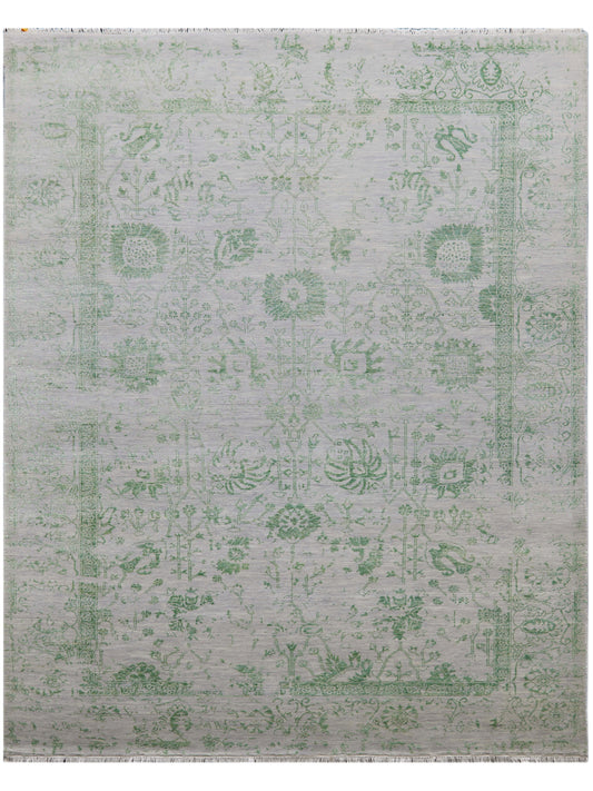 Light gray rug with green vintage-style pattern and flat, textured surface