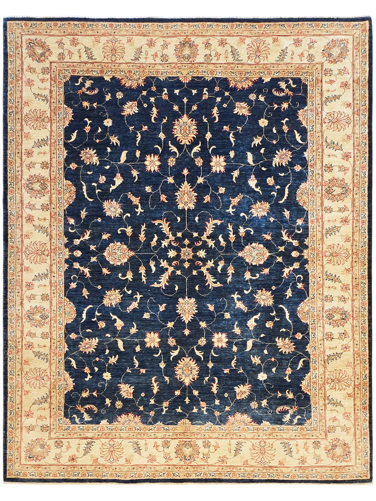 Full view navy rug with cream floral motifs and red-trim border in classic layout.