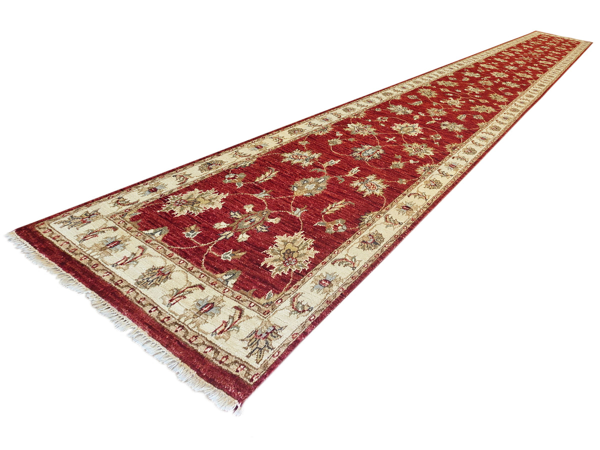 Red traditional runner rug with cream border and ornate floral medallions, 489x80 cm