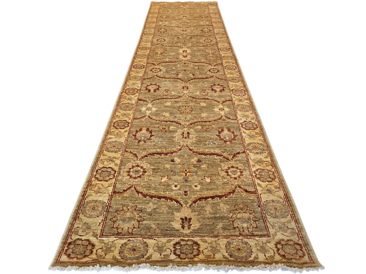 Vintage runner rug, full length view in beige and rust with central medallion and border